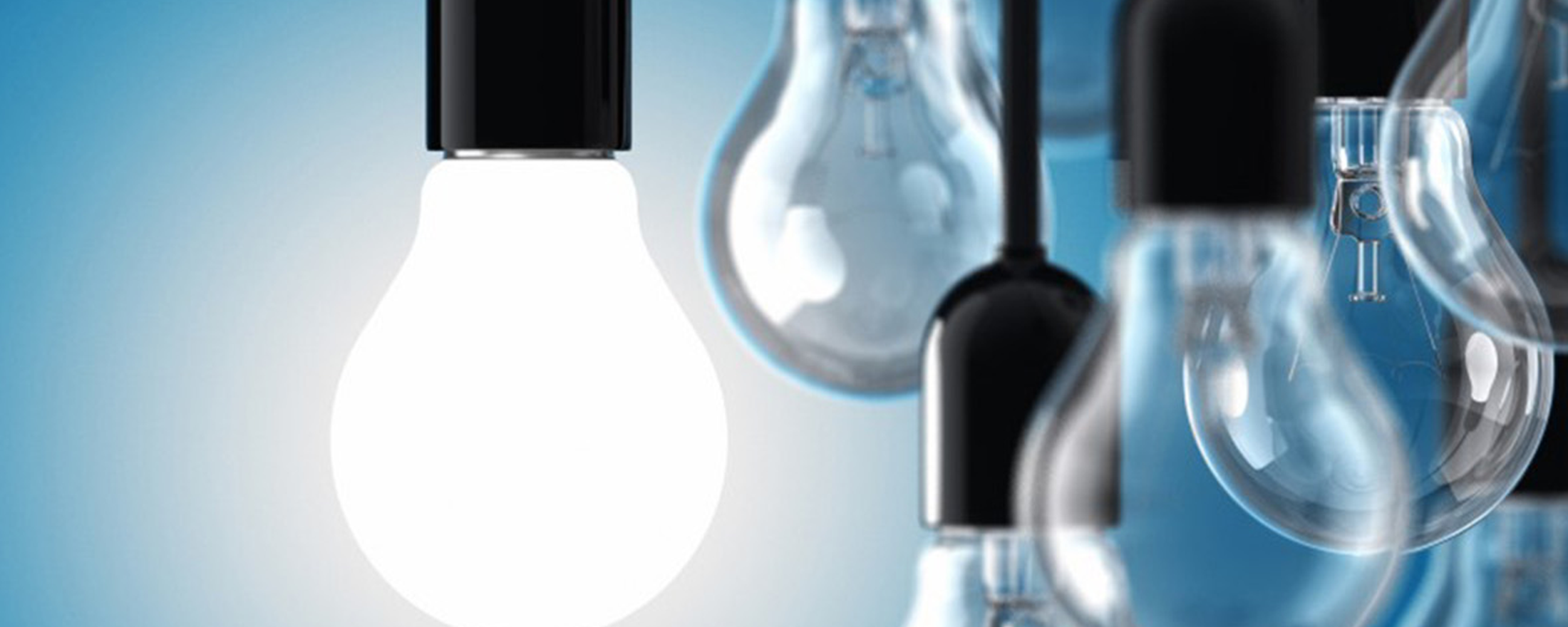 Group of lightbulbs on a blue background.