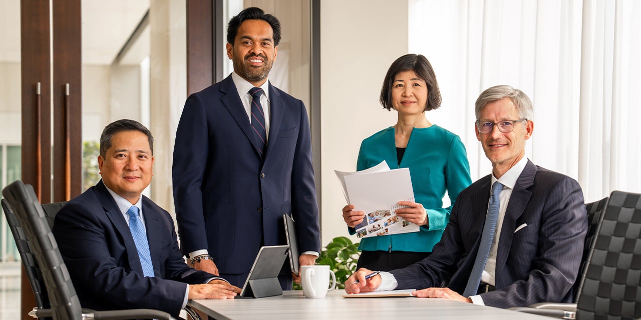 Chautauqua Capital associates at a conference room table.